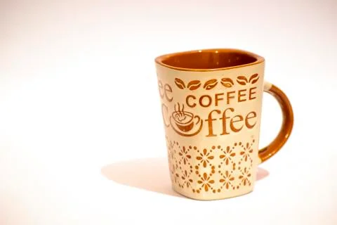 A brown coffee mug Stock Photos