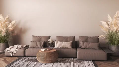 Brown color interior design with sofa, dry palm leaves and wicker table in Stock Footage 246130926