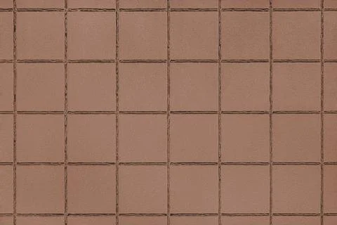 Brown colored ceramic tile texture, background with square geometric patter.. Stock Photos