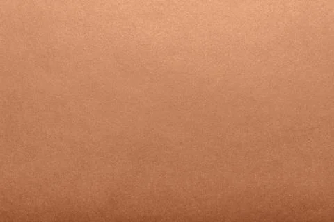 Brown colored paper texture backdrop photo. Stock Photos