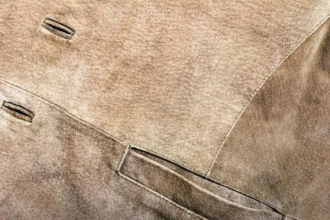 Brown colored suede material jacket texture. Stock Photos