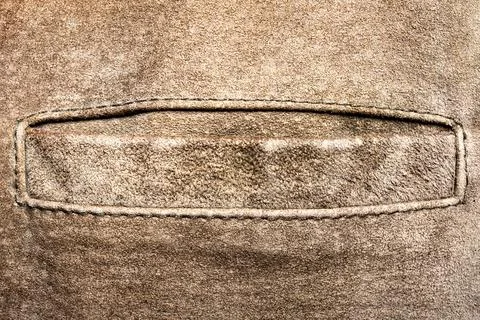 Brown colored suede material texture. Stock Photos