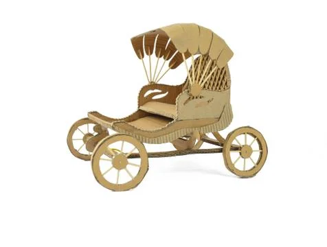 A brown colored wagon made of card board isolated on a white background Stock Photos