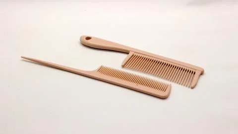 Brown comb isolated Stock Photos