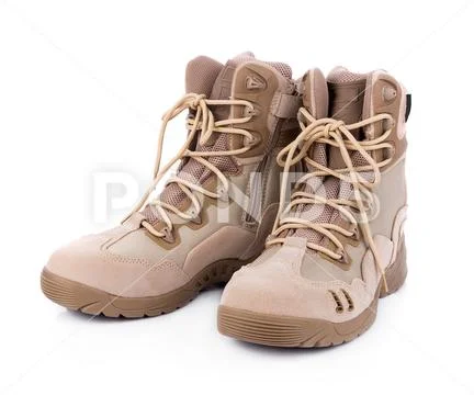 Brown combat boots isolated on white background Stock Photos