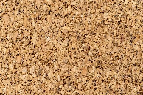 Brown cork texture macro. Background of corkboard. Stock Photos