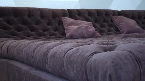 Brown Couch surface with holes Stock Footage 126549586