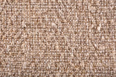 Brown crumpled burlap texture background. Macro of hessian cloth Stock Photos