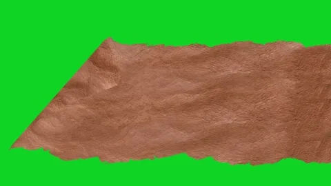 Brown crumpled texture material corner peeling revealing animated on green Stock Footage 335216443