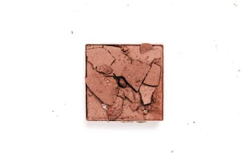 Brown crushed eyeshadows with shimmer. Stock Photos