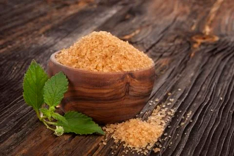 Brown crystal sugar. Stock Photos