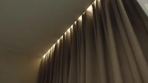 Brown curtain in the room with backlight Stock Footage 295997180
