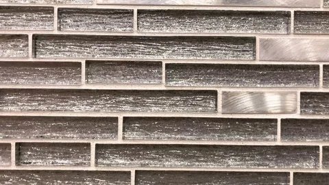 Brown decorative wall or backsplash glass tiles. Worm mosaic tile solution Stock Footage 114501035
