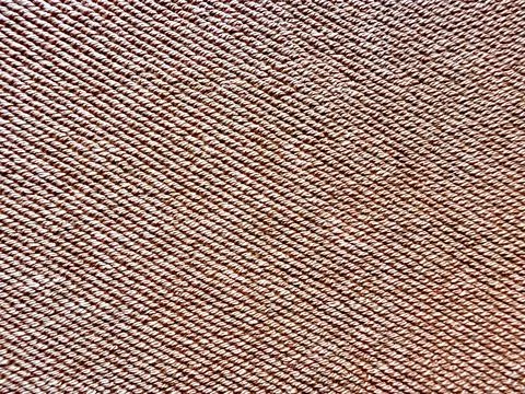 Brown denim texture macro closeup intricate diagonal twill weave rugged earth Stock Photos