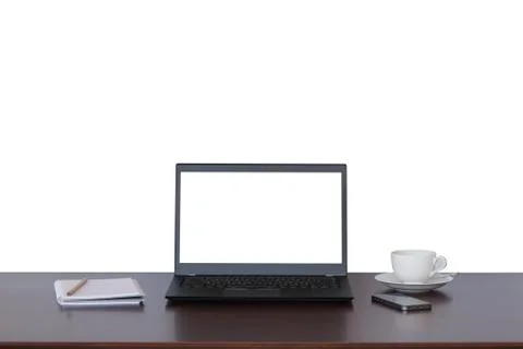 Brown desk with Laptop, notebook computer, mobile at coffee shop with blur ba Stock Photos