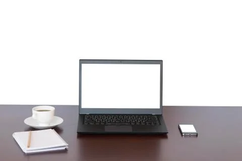 Brown desk with Laptop, notebook computer, mobile isolate on white background Foto stock