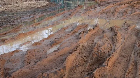 Brown dirt, mud and puddles Video stock 48406484
