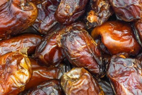Brown dried dates. background or texture Stock Photos