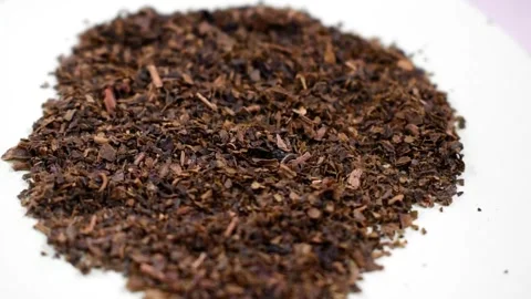 Brown dried tea herbs piled together Stock Footage 262470949