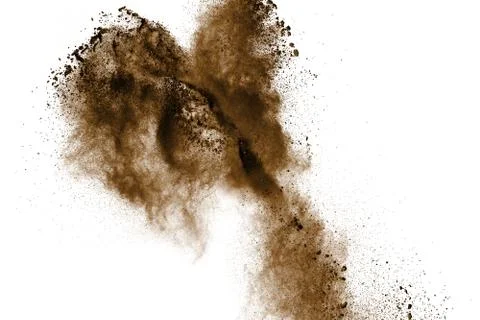 Brown dust cloud.Brown particles splattered on white background. Stock Photos