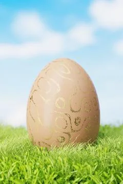Brown Easter egg with gold patterns on a meadow in the grass. 3d render. Ilustración de archivo
