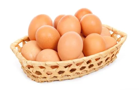 Brown eggs in a basket Stock Photos