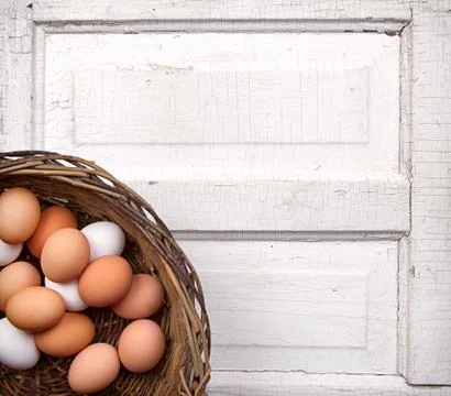 Brown eggs in a basket Stock Photos