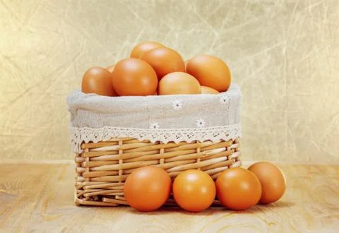 Brown eggs in basket Stock Photos