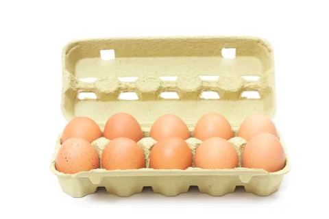 Brown eggs in box Stock Photos