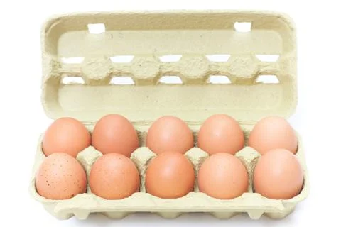 Brown eggs in box Stock Photos