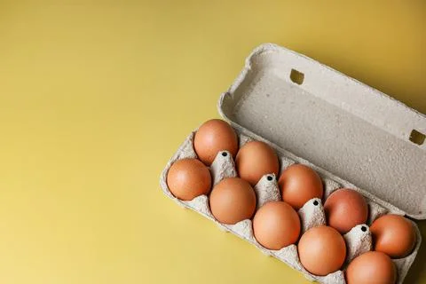 Brown eggs in eco packaging made from recycled materials Stock Photos