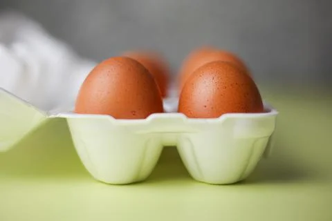 Brown eggs in expanded polystyrene packaging Stock Photos
