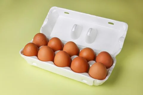 Brown eggs in expanded polystyrene packaging Stock Photos