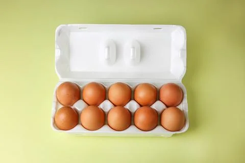 Brown eggs in expanded polystyrene packaging Stock Photos