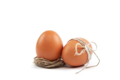 Brown eggs isolated on a white background. Stock Photos