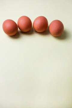 Brown eggs on a light isolated background for copyspace, text Fotos de archivo
