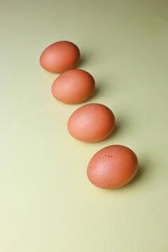 Brown eggs on a light isolated background for copyspace, text Foto stock