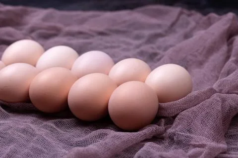 Brown eggs on napkin Stock Photos