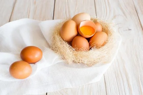Brown eggs in a nest Stock Photos