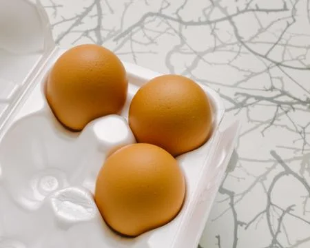 Brown Eggs On Table Stock Photos