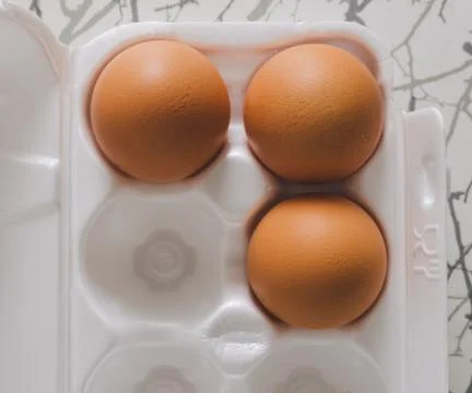 Brown Eggs On Table Stock Photos