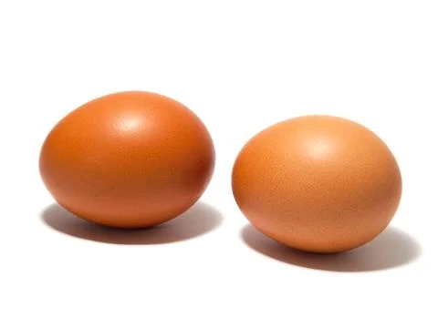 Brown eggs on the white background Foto stock