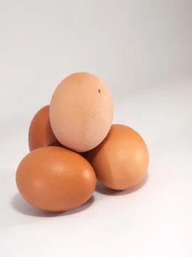 Brown eggs on the white background Foto stock