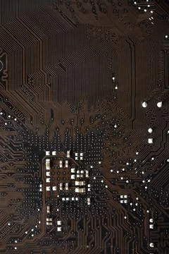 Brown electronic board with trace elements. Radio elements on the board. Foto stock