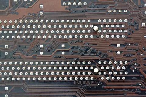 Brown electronics background of computer mainboard. 스톡 사진