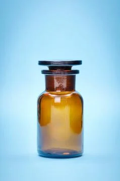 Brown empty glass bottle Stock Photos