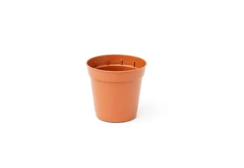 Brown empty plastic flower pot isolated on white Foto stock