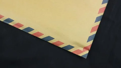 Brown envelope on black background. Brown envelope front and back isolated .. Stock Photos