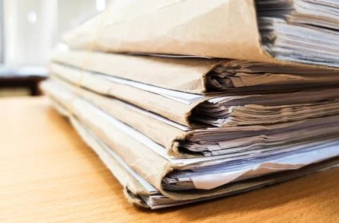 Brown envelope with paper document for office concept Background. Stock Photos