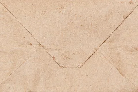A brown envelope with a white border 스톡 사진